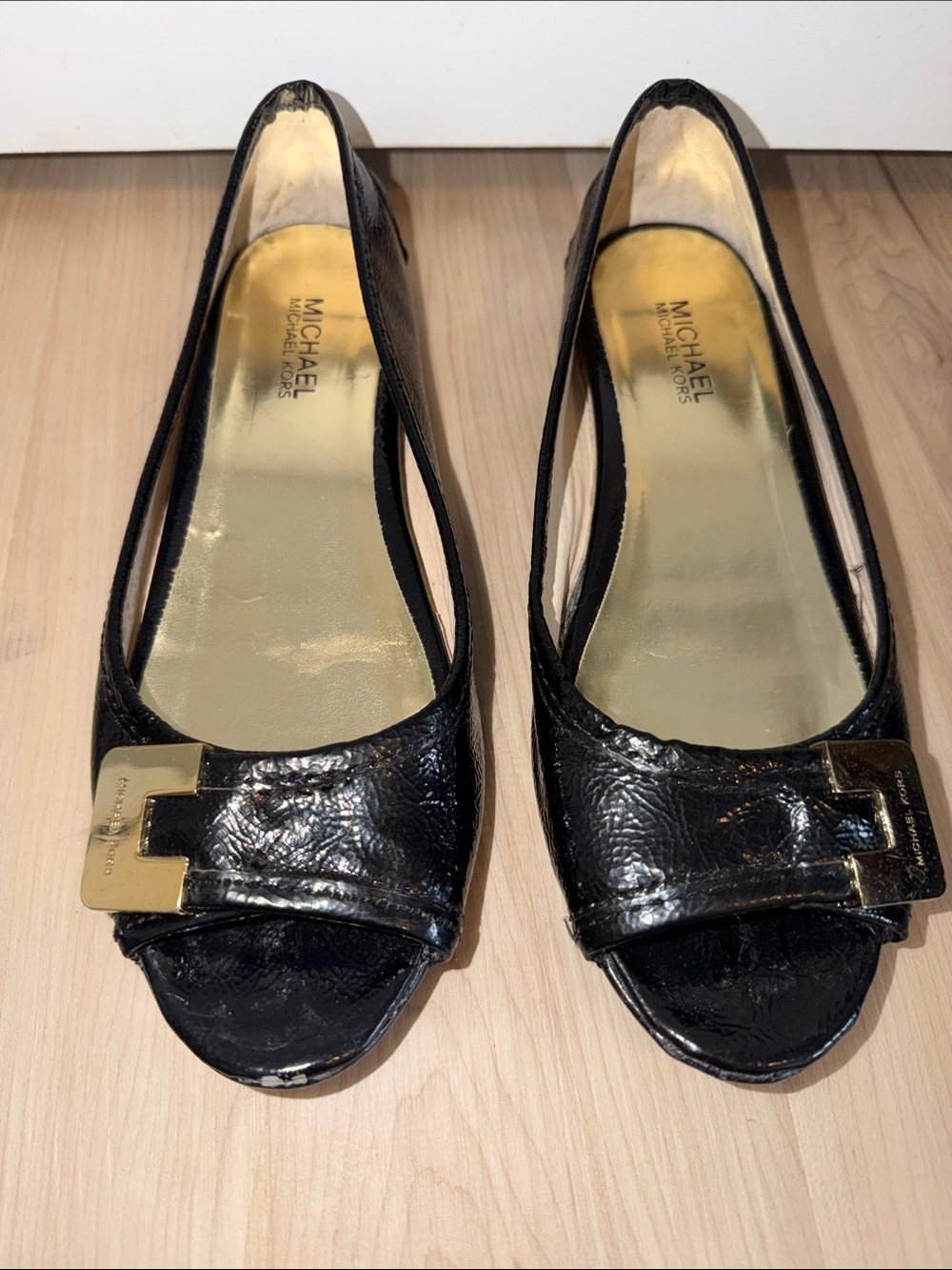 MICHAEL Michael Kors Black Patent Peep-Toe Flats with Gold Buckle